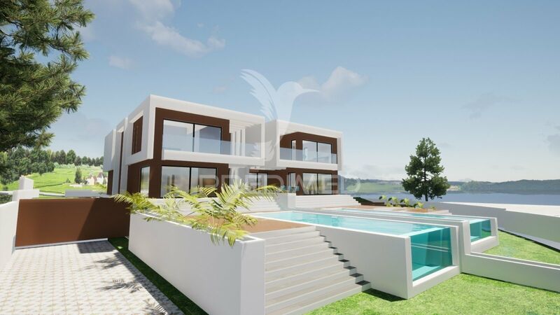 Moradia de luxo V5 Carvalhal Grândola - garagem, painéis solares, alarme, ténis, piscina, jardim, videovigilância, ar condicionado, vista mar