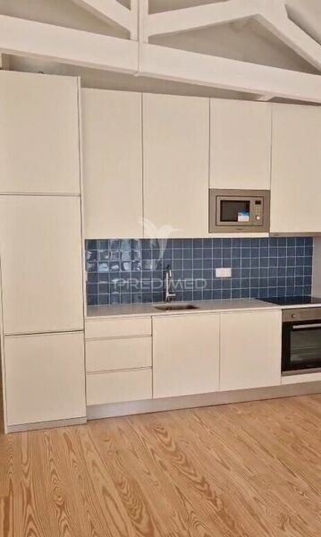 Apartamento T1 novo São Nicolau Porto - cozinha equipada, ar condicionado