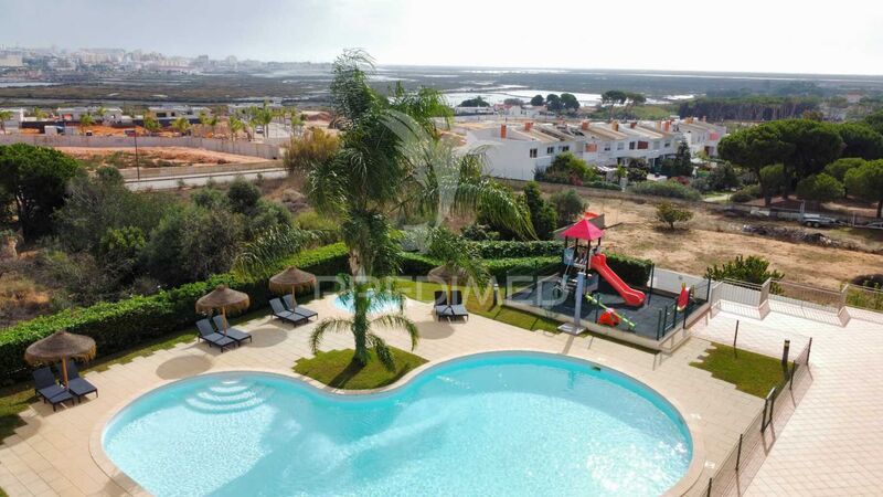 Moradia de luxo V4 Montenegro Faro - piscina, bbq, garagem, ar condicionado, terraço, arrecadação, condomínio privado, portão automático, parque infantil
