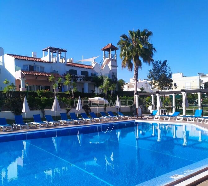 Apartment T2 Quarteira Loulé - gardens, air conditioning, terrace, balcony, playground, condominium, double glazing, swimming pool, tennis court, kitchen