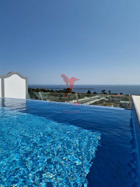 Apartment 3 bedrooms Duplex in the center Sines - swimming pool, fireplace, air conditioning, kitchen, terrace, store room, double glazing, sea view, balcony