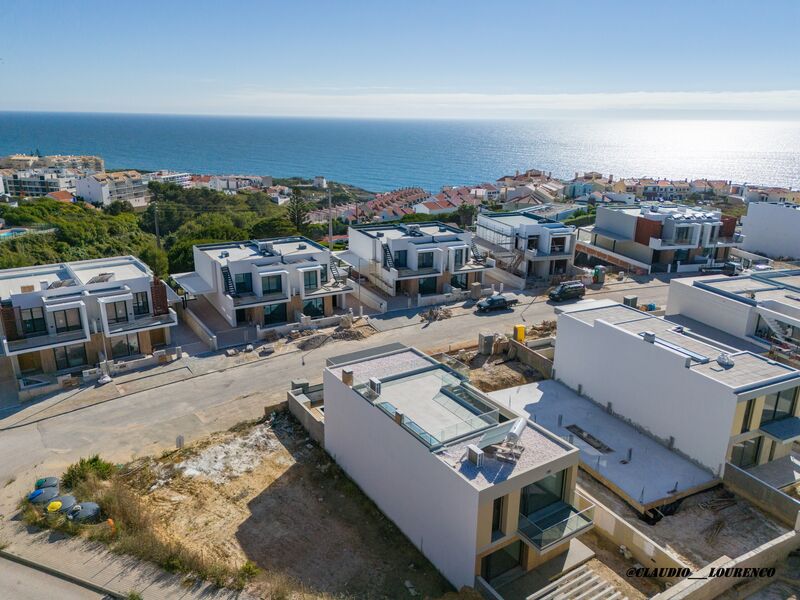 Moradia em urbanização V4 Ericeira Mafra - painéis solares, terraço, ar condicionado, vista mar, cozinha equipada, varandas, jardim, piscina, bbq, lareira