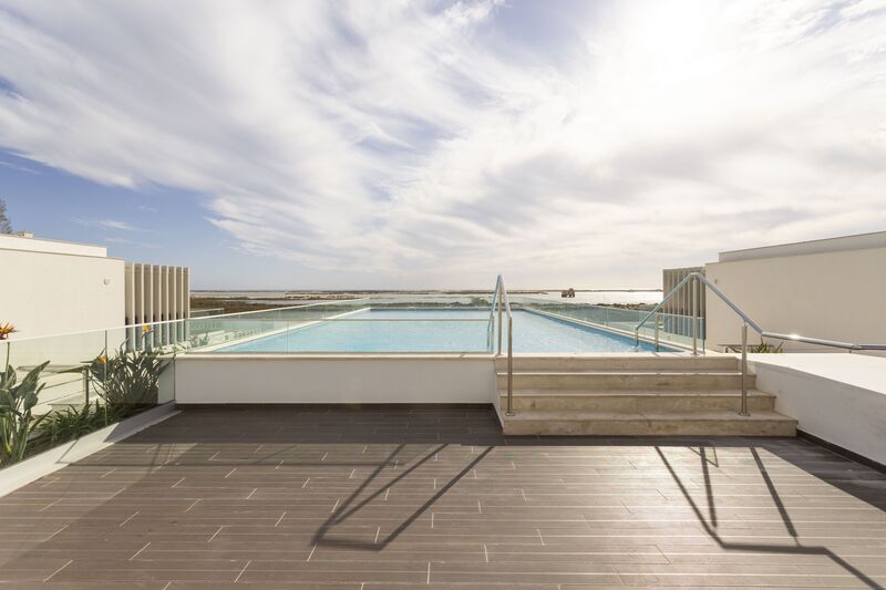 Apartment 3 bedrooms Modern Fuseta Olhão - swimming pool, store room, solar panels, gated community, air conditioning