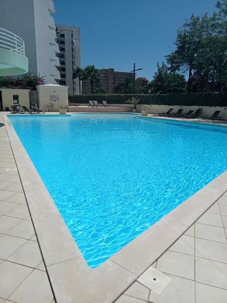 Apartamento T2 Quarteira Loulé - equipado, lugar de garagem, jardim, piscina, varanda