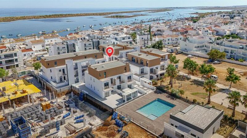 Apartamento T2 Cabanas de Tavira - varanda, piscina, cozinha equipada, garagem, terraço, lugar de garagem