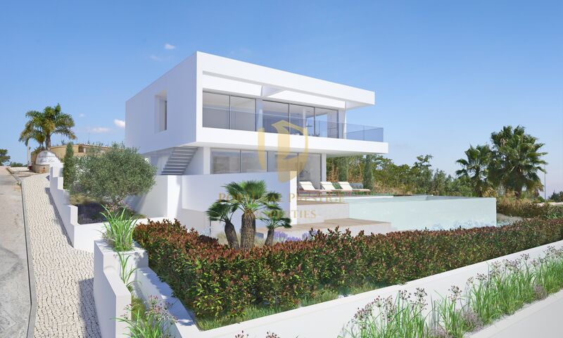 Moradia nova em construção V3 Luz Lagos - terraço, ar condicionado, jardim, vidros duplos, caldeira, piscina, bbq, garagem, alarme