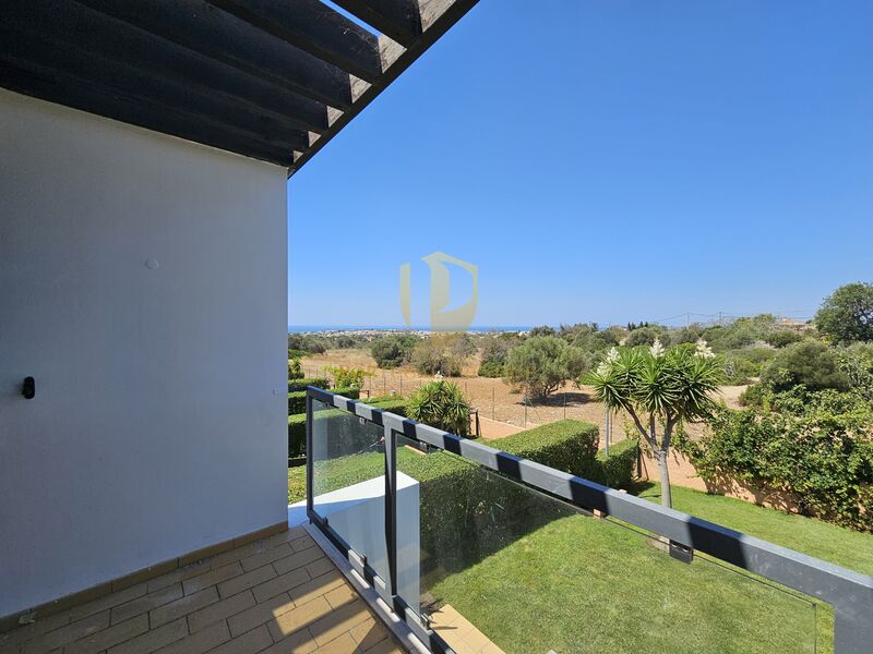 House 3 bedrooms Semidetached Albufeira - terrace, gated community, sea view, garden, barbecue, air conditioning, balcony, plenty of natural light, fireplace, swimming pool