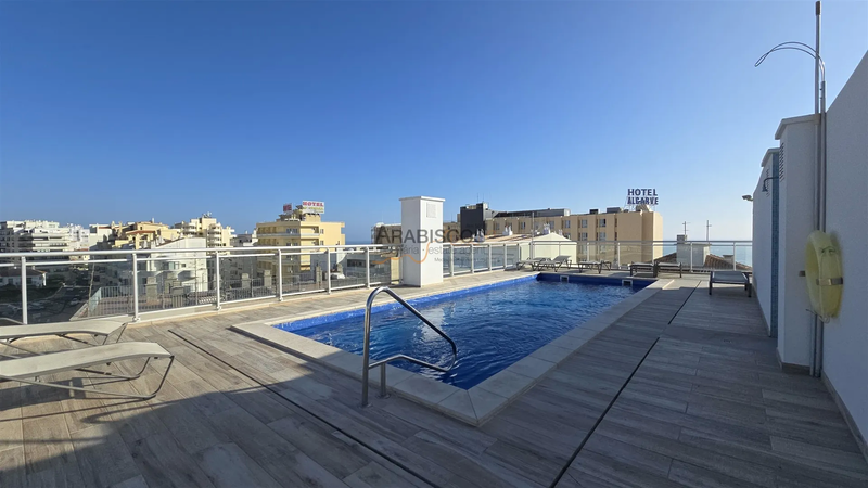 Apartment 3 bedrooms Modern in the center Praia da Rocha - Centro Portimão - balconies, swimming pool, air conditioning, equipped, garage, sea view, furnished, 2nd floor, balcony