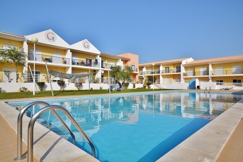 Apartamento T2 Vale de Parra Guia Albufeira - parque infantil, piscina, bbq, condomínio fechado, varanda, zona calma, jardim, arrecadação