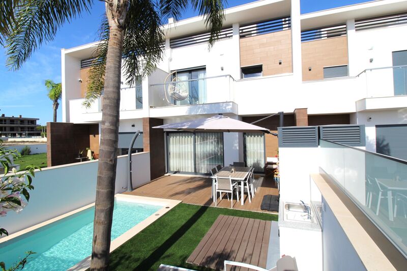 House V4 townhouse Ferreiras Albufeira - equipped kitchen, swimming pool, air conditioning, solar panels, garden, barbecue, double glazing, balconies, balcony, garage