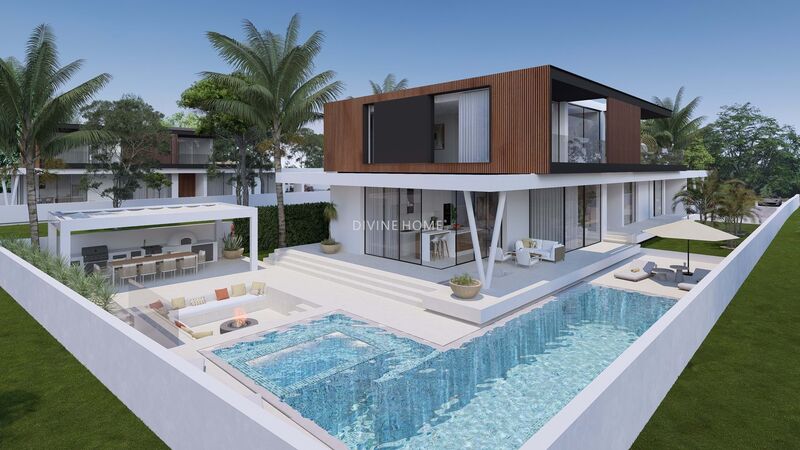 Moradia V4 de luxo em construção Albufeira e Olhos de Água - piscina, vidros duplos, jardim, painéis solares, varandas