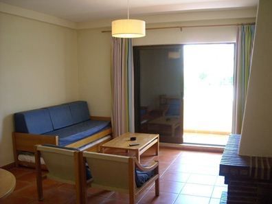 Sala com sofá-cama