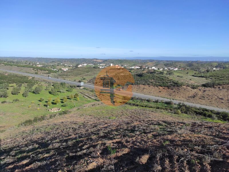 Land nieuw with 29760sqm Junqueira Castro Marim - water, easy access, orange trees, well, olive trees