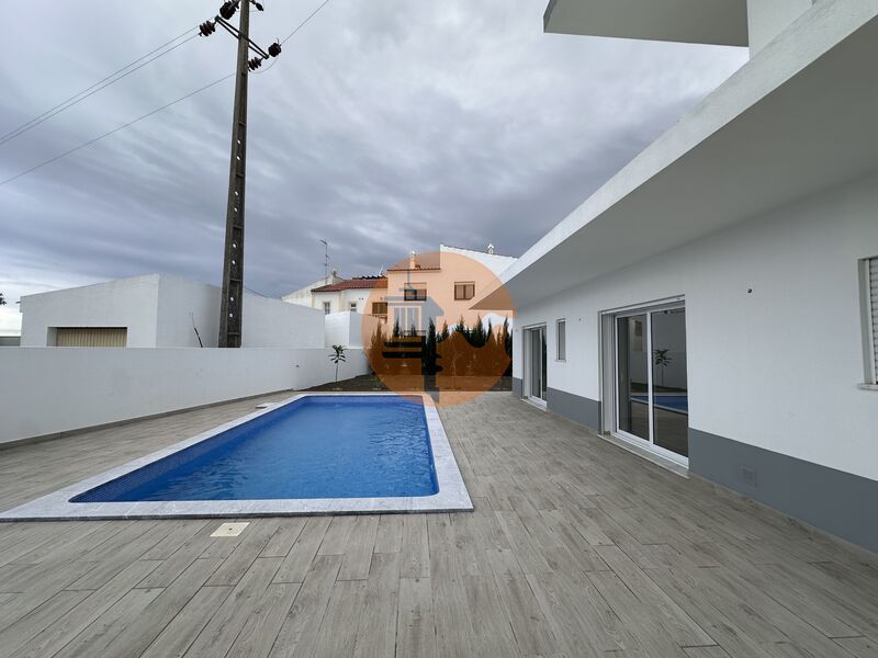 Moradia V4 Moderna perto da praia Altura Castro Marim - terraços, painéis solares, ar condicionado, piscina, jardim, piso radiante, vidros duplos, vista mar, garagem