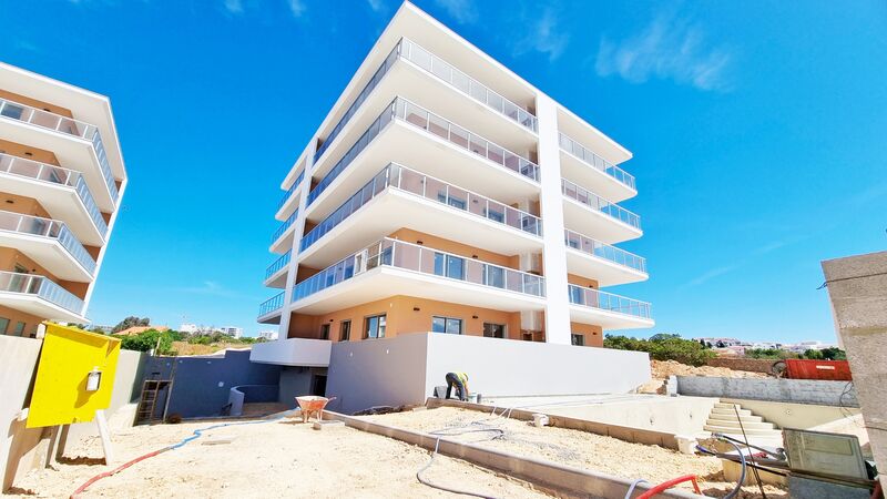 Apartamento T1+1 Moderno em construção Praia da Rocha Portimão - varandas, ar condicionado, vista mar, piscina, chão radiante, jardim