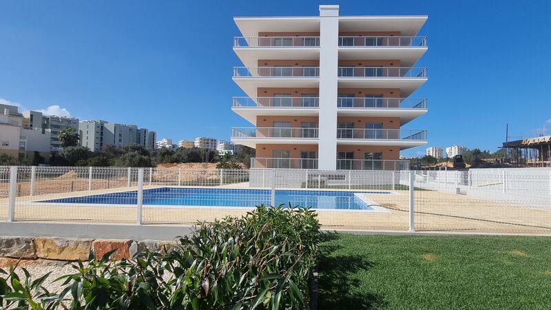 Apartamento novo T0+1 Praia da Rocha Portimão - piscina, varandas, ar condicionado, chão radiante, jardim, vista mar