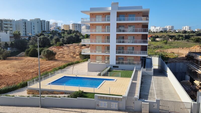 Apartamento novo T0+1 Praia da Rocha Portimão - piscina, jardim, varandas, ar condicionado, vista mar, chão radiante