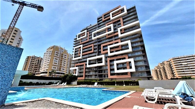 Apartamento com vista mar T2 Portimão - ar condicionado, jardim, videovigilância, piscina, garagem, condomínio fechado, vista mar