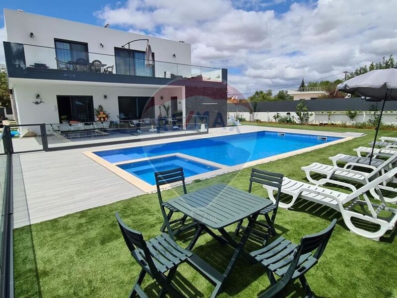 House Modern 6 bedrooms Almancil Loulé - tiled stove, equipped, barbecue, swimming pool, air conditioning, balconies, equipped kitchen, balcony, garden, solar panels, double glazing